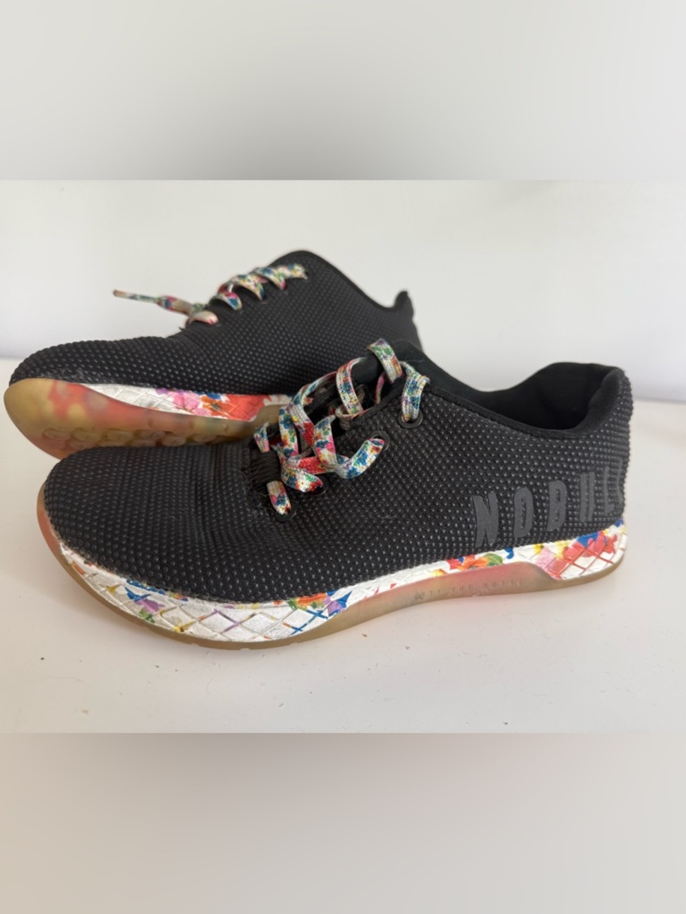NOBULL Black Knit Runners with Multicolor Floral Accents